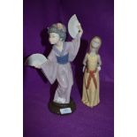 Two Lladro figurines.