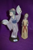 Two Lladro figurines.