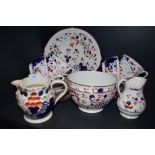 A part tea service hand decorated in Sunderland Lustre design compirising of slop bowls teacups