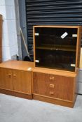 A set of Danish teak units comprising drawer set, glass fronted cabinet and low cupboard