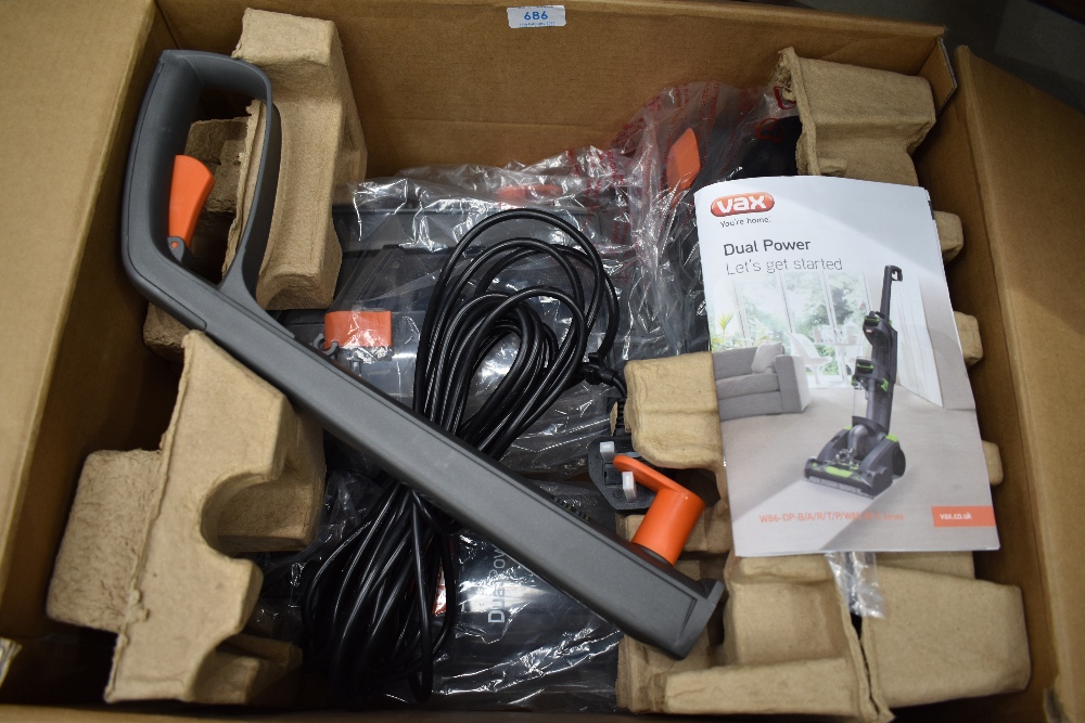 A Vax Dual Power carpet cleaner, boxed, looks unused