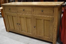 A modern solid oak sideboard by Willis and Gambier outlook measuring approx 160cm long 49cm wide and