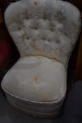 A button back low dressing or similar chair in good condition