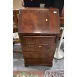 A reproduction mahogany dwarf bureau, width approx. 52cm