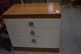 A retro laminated chest of drawers in good condition