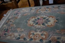 A clean carpet rug measuring approx 130cmx70cm