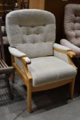 A modern beech wood framed arm chair