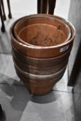 A selection of terracotta garden plant pots some marked made in Italy