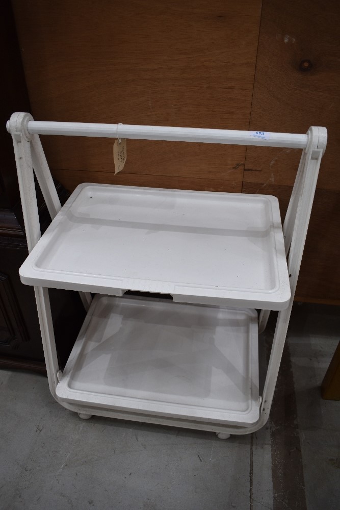 A white plastic folding trolley