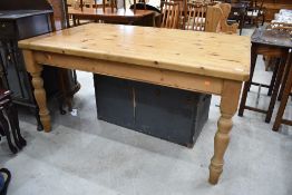 A traditional pine kitchen table, approx. 153 x 92cm