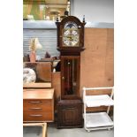 A reproduction long case clock having glazed panel to front