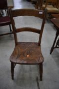 A Victorian solid seat kitchen chair on turned legs