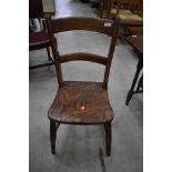 A Victorian solid seat kitchen chair on turned legs