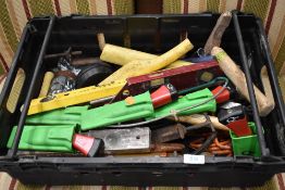 A selection of gardening and building tools including Stabila level