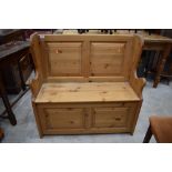 A modern natural pine box settle of small proportions, width approx. 91cm