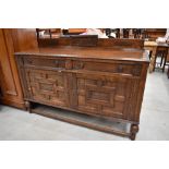 An early 20th Century oak sideboard, width approx. 153cm