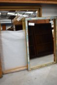 Two modern decorative hall way mirrors one gold gilt effect with bevel edged glass