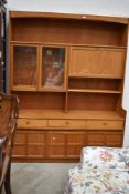 A Nathan teak wall unit, approx. width 153cm, height 195cm