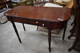 A 19th Century mahogany side table (formerly part of D end) on turned legs, width approx. 120cm