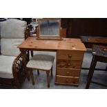 A modern pine dressing table, width approx. 100cm with free standing mirror and stool,