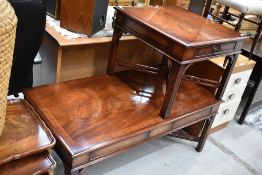 Two modern mahogany style low tables one square and similar longer coffee table version both very