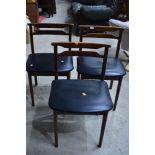 A set of three vintage Danish styled chairs with black vinyl coverings