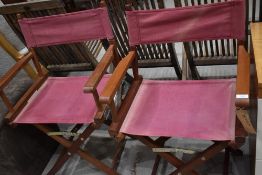 Two collapsible directors style garden chairs in iroko wood