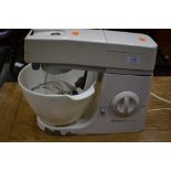 A Kenwood kitchen aid or chef with plastic bowl and accessories