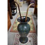 A vintage papier mache stick stand of vase form, height approx. 67cm and two sticks