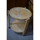 A folding beech wood tea or similar trolley