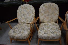 A pair of light Ercol cottage style armchairs