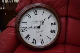 A large sized wooden cased Panama Newgate clock