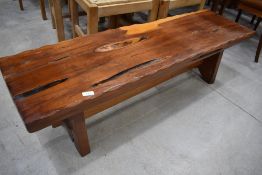 A rustic yew wood form, approx. 133 x 38cm, would work equally well as a coffee table