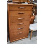 A vintage G plan or similar six drawer chest having extra deep bottom drawer, dimensions approx. W64