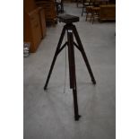 A vintage fold away wooden surveyors or architects tripod for theodolite/similar ideal for lighting