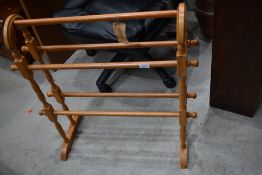 A traditional wooden towel rail