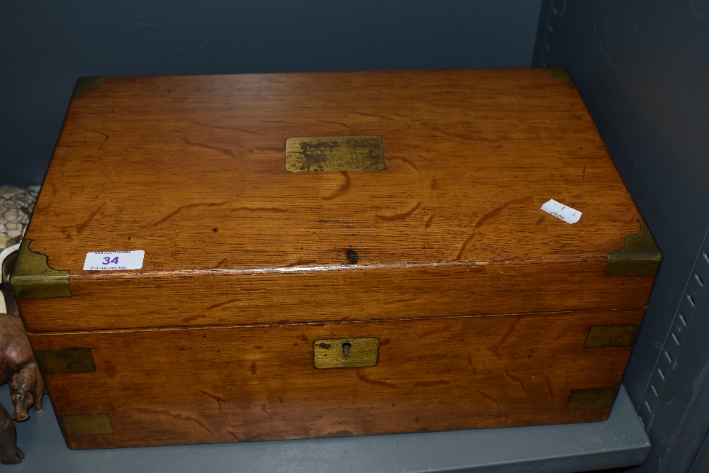 A late Victorian golden oak veneered mahogany writing slope, having brass corner protectors and - Image 2 of 2