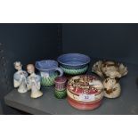 A variety of ceramics including two vintage half dolls, A Lancaster pottery trinket pot, and some
