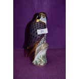 A Royal Crown Derby paperweight Peregrine Falcon with a Gold stopper