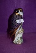 A Royal Crown Derby paperweight Peregrine Falcon with a Gold stopper