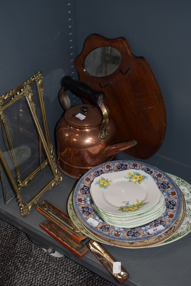 A miscellany of items including copper kettle,plates, two frames, harmonicas and similar.