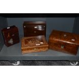 An assortment of boxes including walnut veneered with mother of pearl inlay, etched examples and