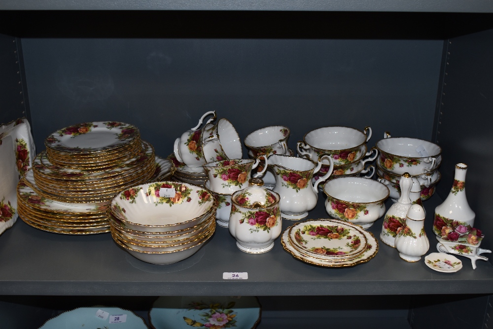 A selection of Royal Albert country roses, including plates,bowls,preserve pot, cups and saucers and