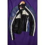 A Hein Gericke leather motorcycle jacket.