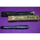 A Merkator 1 fountain pen having blue snake skin effect, two gold bands to top and vacuum fill