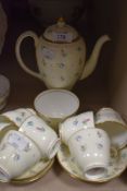 A collection of wedgwood s123 coffee cups and saucers and coffee pot, having cream ground with