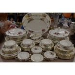 Around sixty two items of Royal Worcester Roanoke, including plates, tureens, platters and much