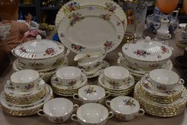 Around sixty two items of Royal Worcester Roanoke, including plates, tureens, platters and much