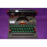 A vintage Lilliput Typewriter.