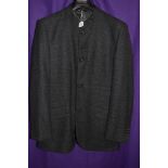 A gents grey Emanuel Ungaro Paris jacket and a pair of M&S black trousers.